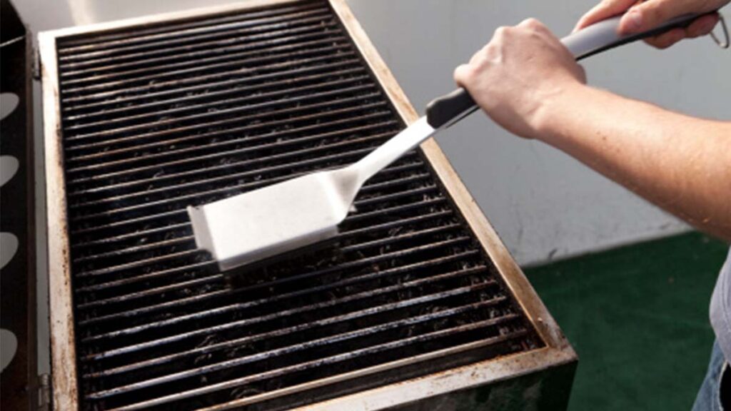clean a flat top grill with a stone